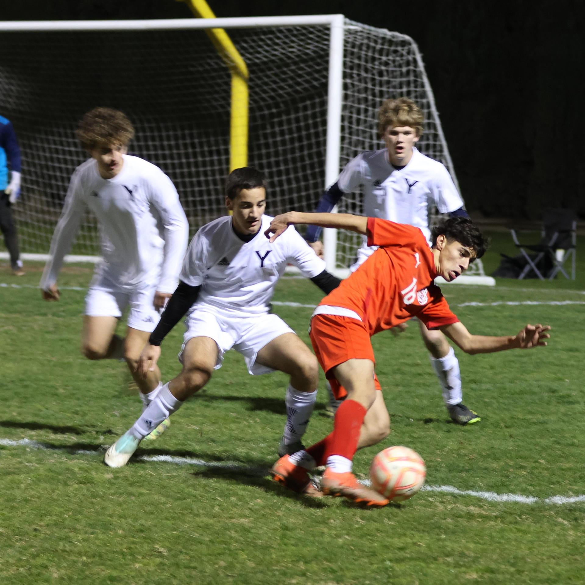 varisty boys soccer playing against yosemite