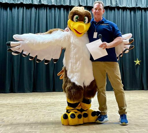Picture of Rivergold Hawk Mascot with Principal Smoljan