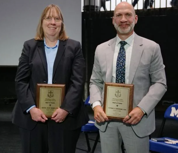 Diane Hakey and Conrad Choiniere with their MVU Hall of Fame Placques