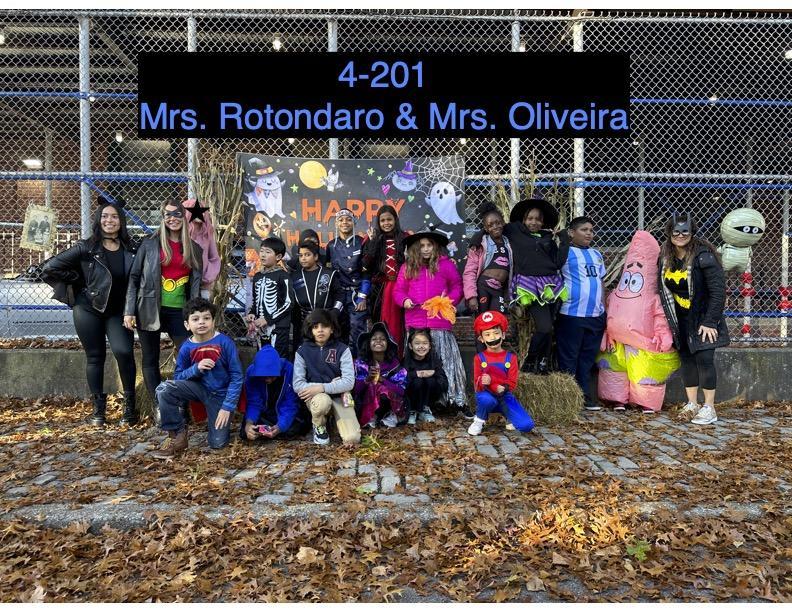 staff and students in halloween costumes