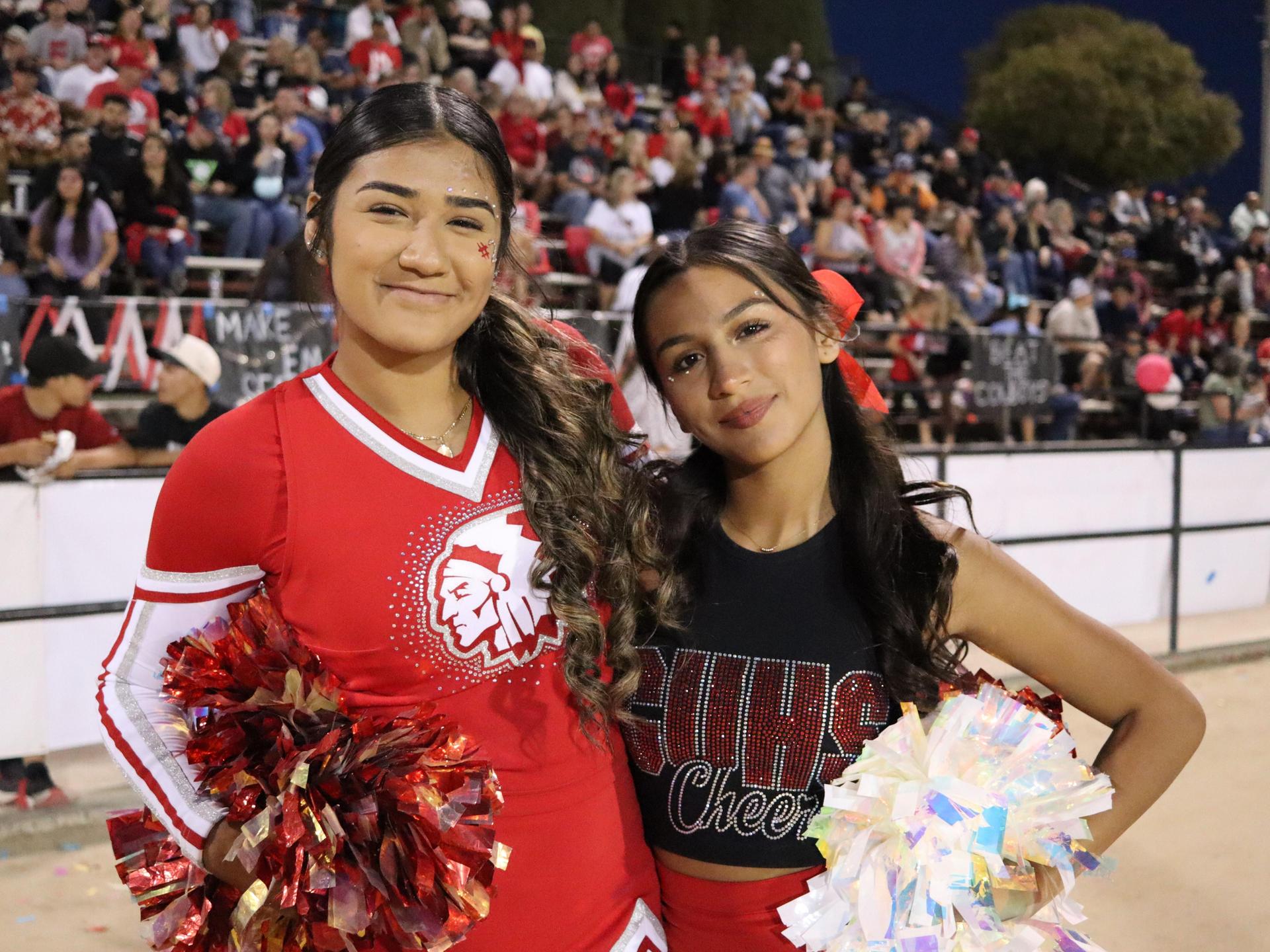 varsity cheerleaders in action at the Riverdale game