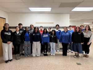 Image of 16 high school choral students