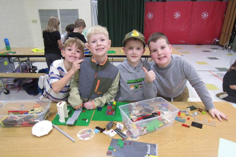 Kindergarteners Angelo Scherff, Isaac Smithmyer, Wesley Pahel and Henry Wagner build a Lego structure