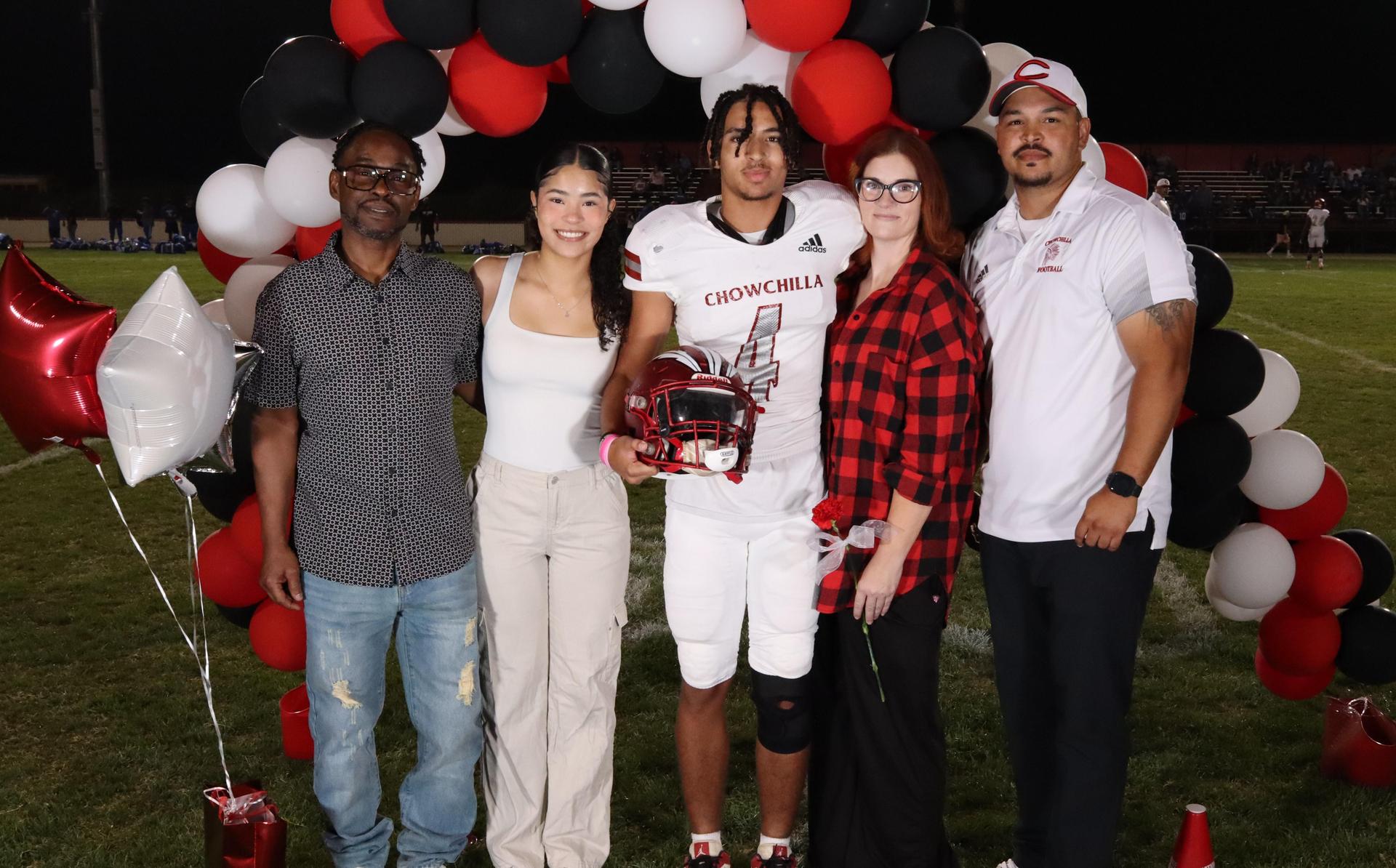seniors and their escorts celebrating senior night