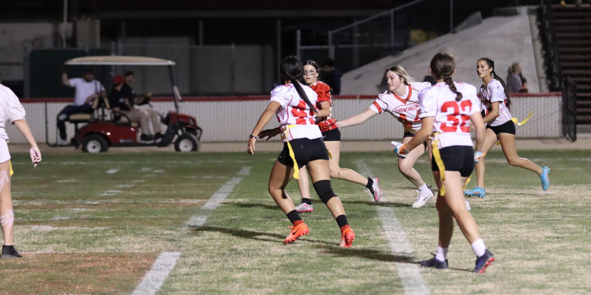 girls playing flag football