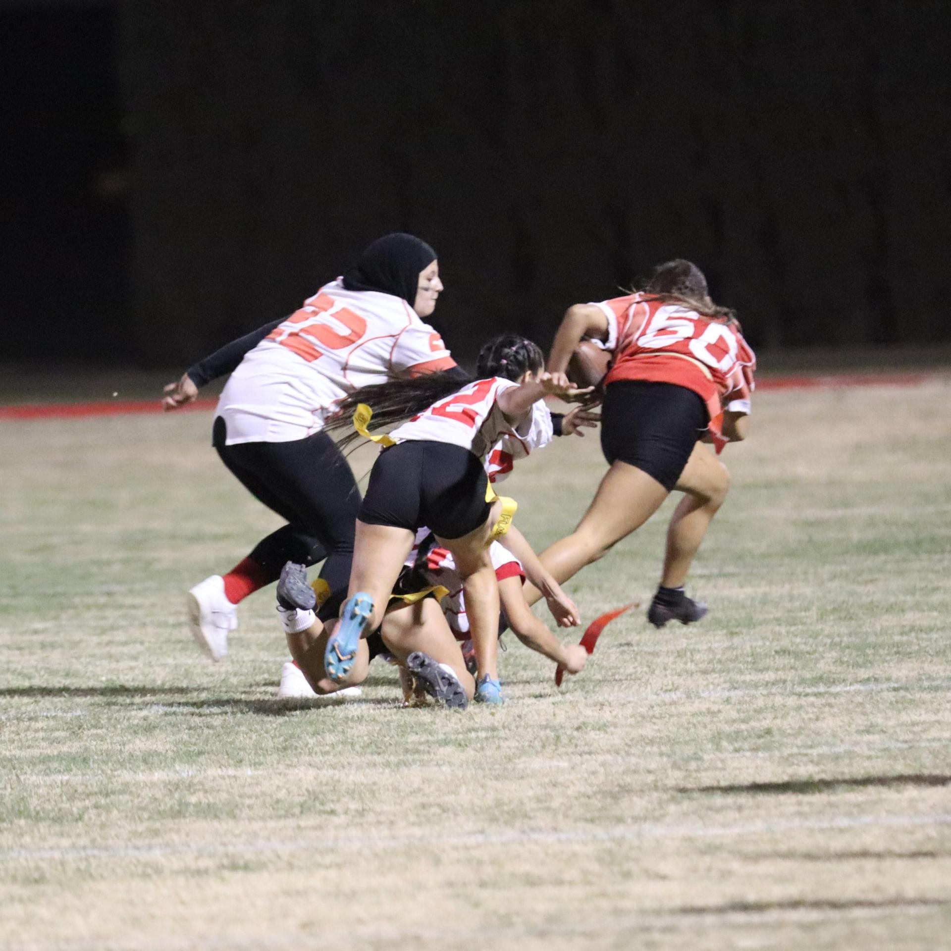 girls playing flag football