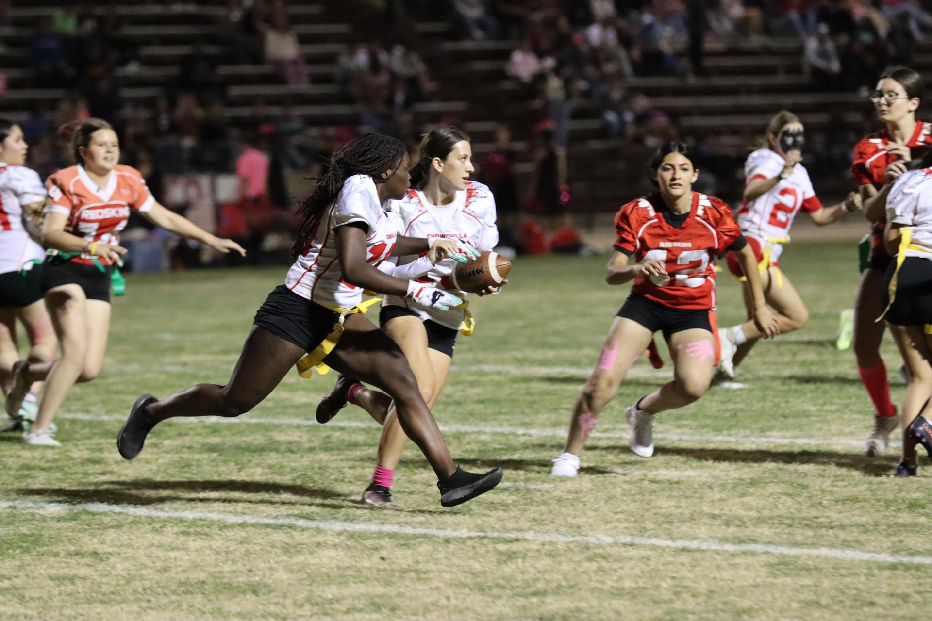 girls playing flag football