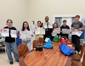 Kids going through their goodie bags.