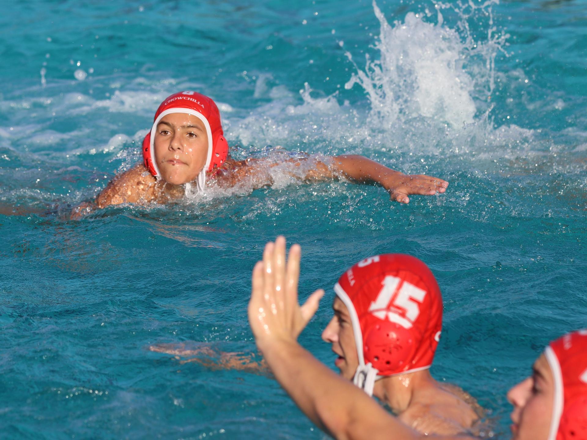 Boys playing water polo against Yosemite