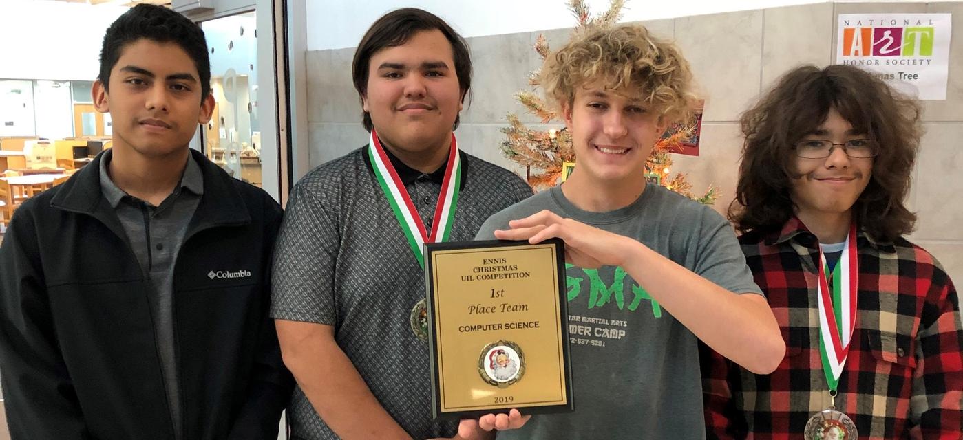 four students pose with medals & award from UIL competition