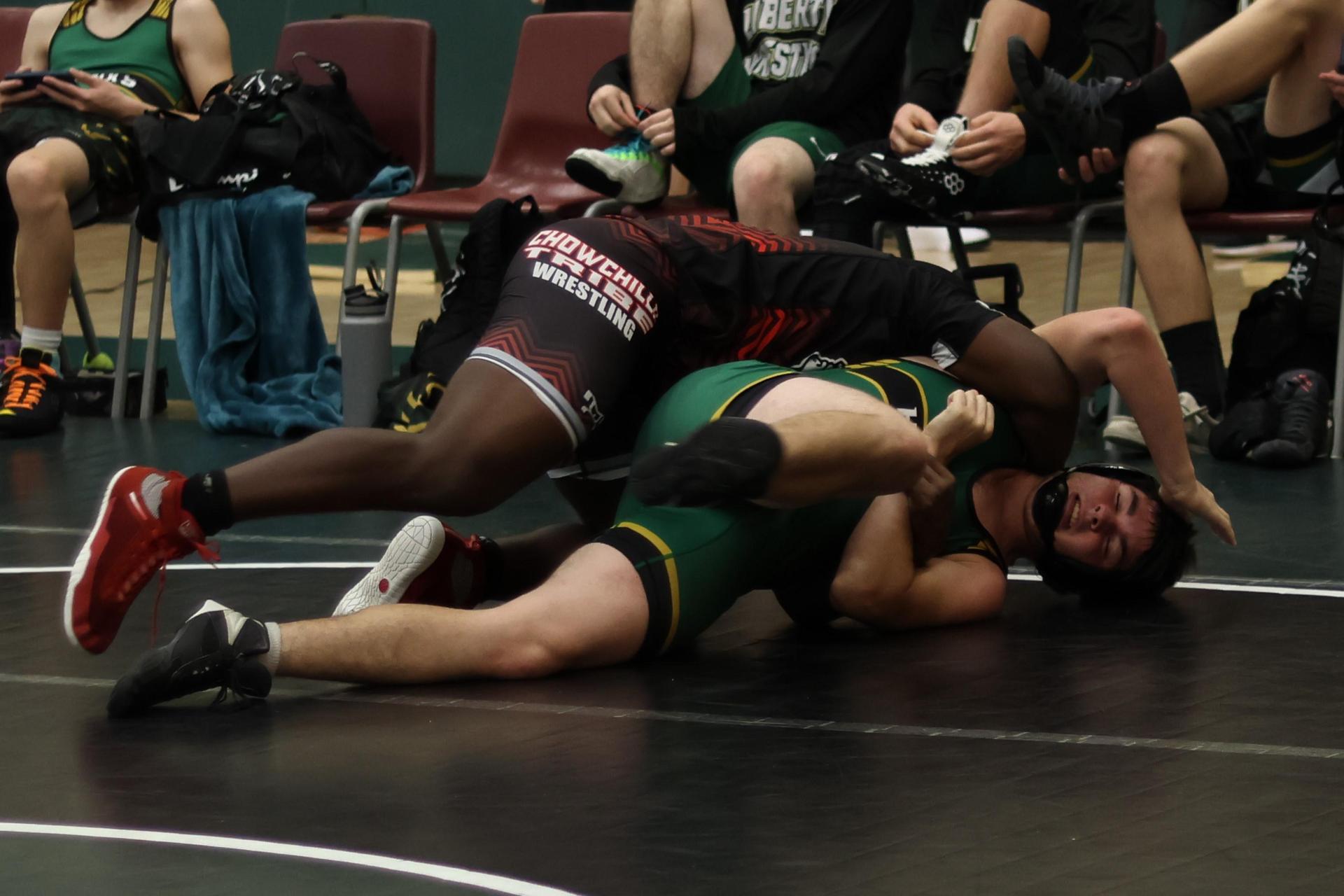 boys wrestling at liberty duals