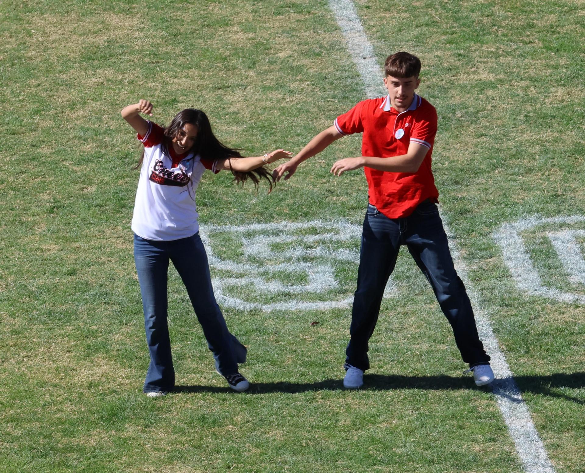 students and staff at the homecoming rally