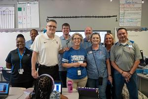 TISD administrators recognize a TIA recipient at Sampson-Howard Elementary