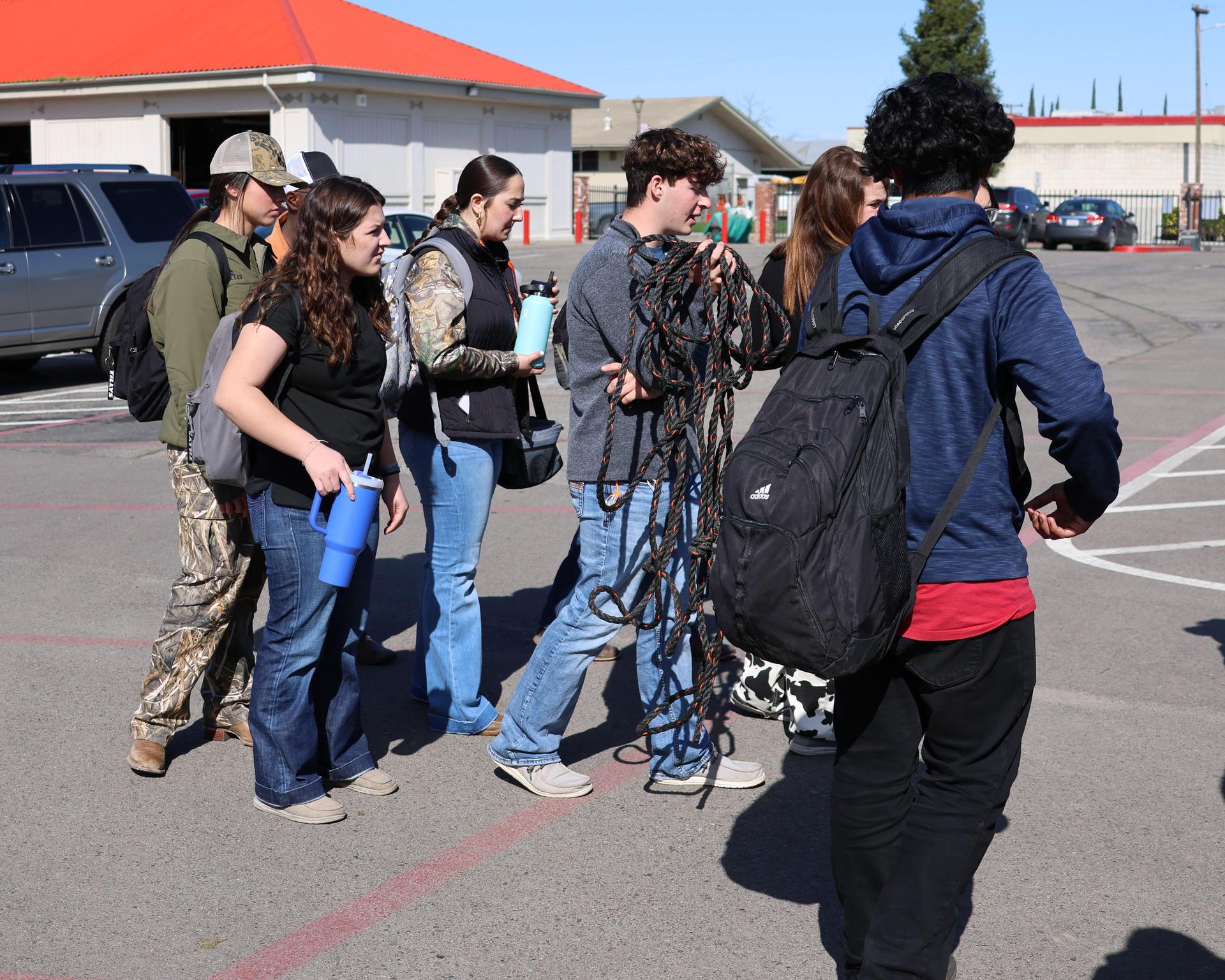 students and staff enjoying the truck pull