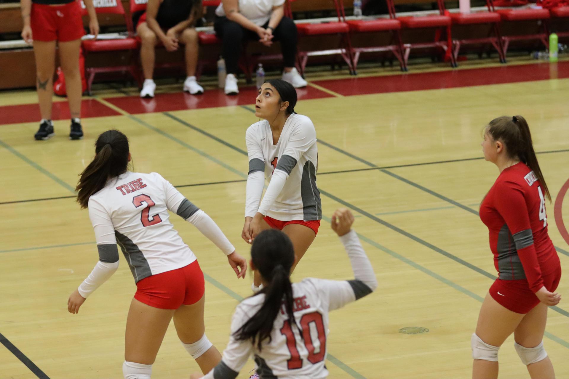 junior varsity girls playing volleyball against Liberty