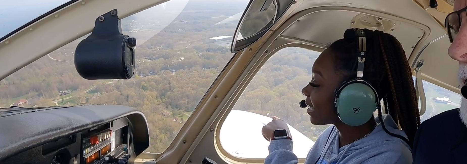 students and teacher flying