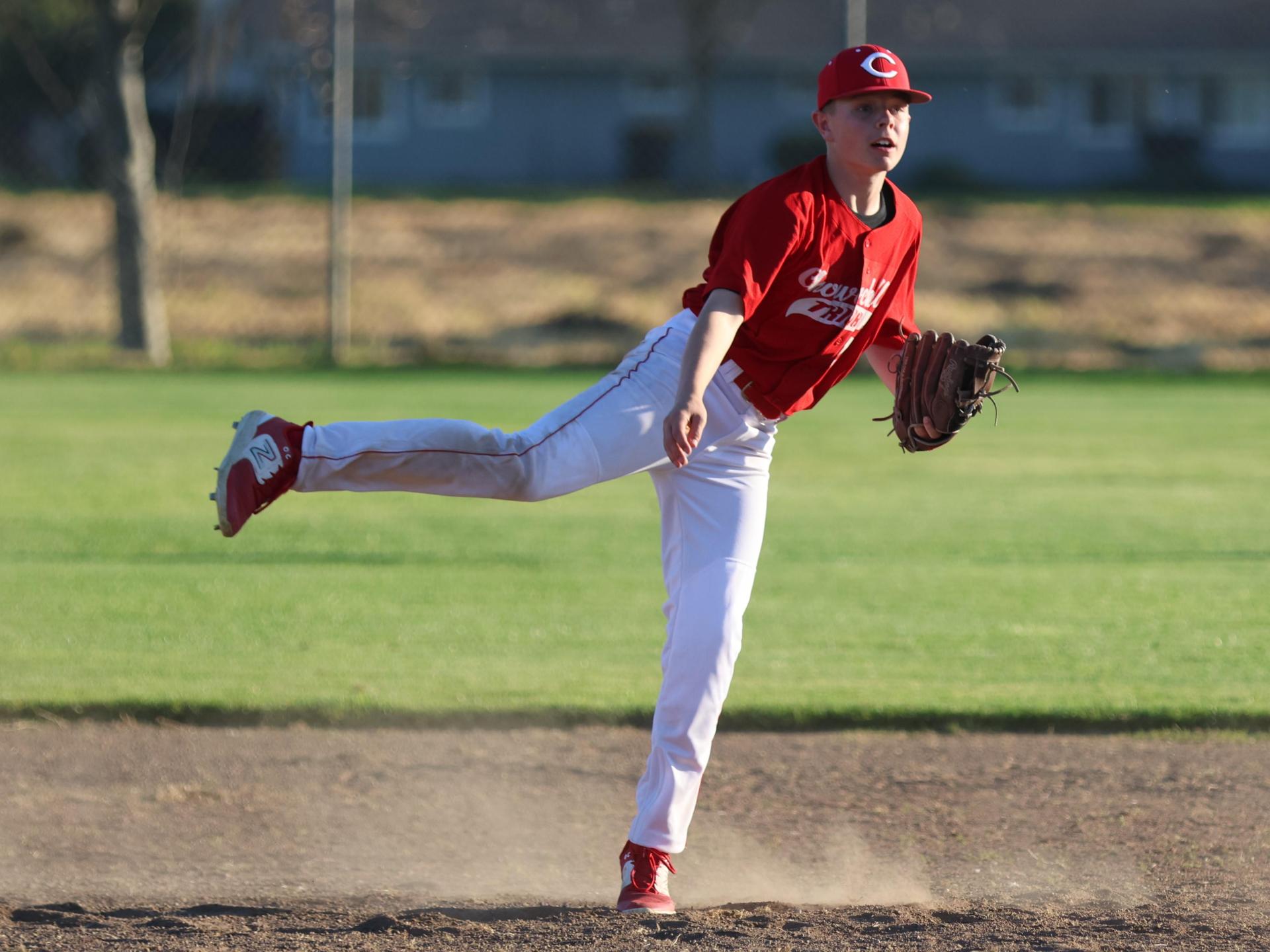junior varsity baseball players in action