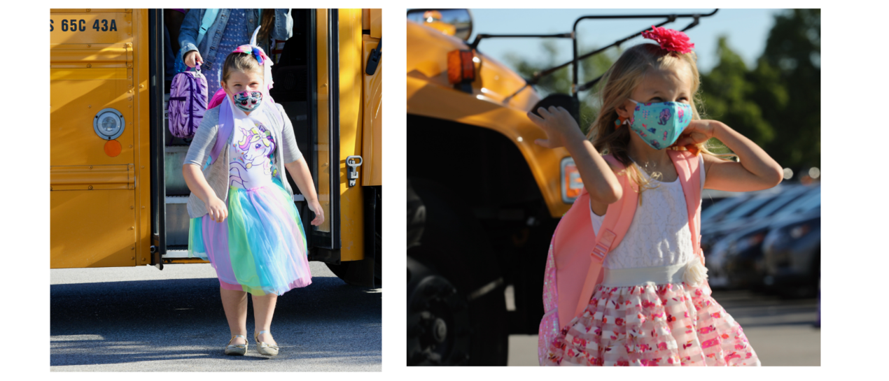 elementary girls getting off the bus
