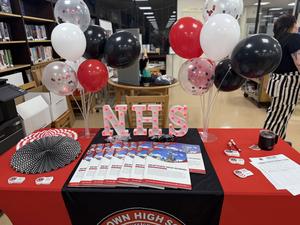 a table with newtown stuff during the open house
