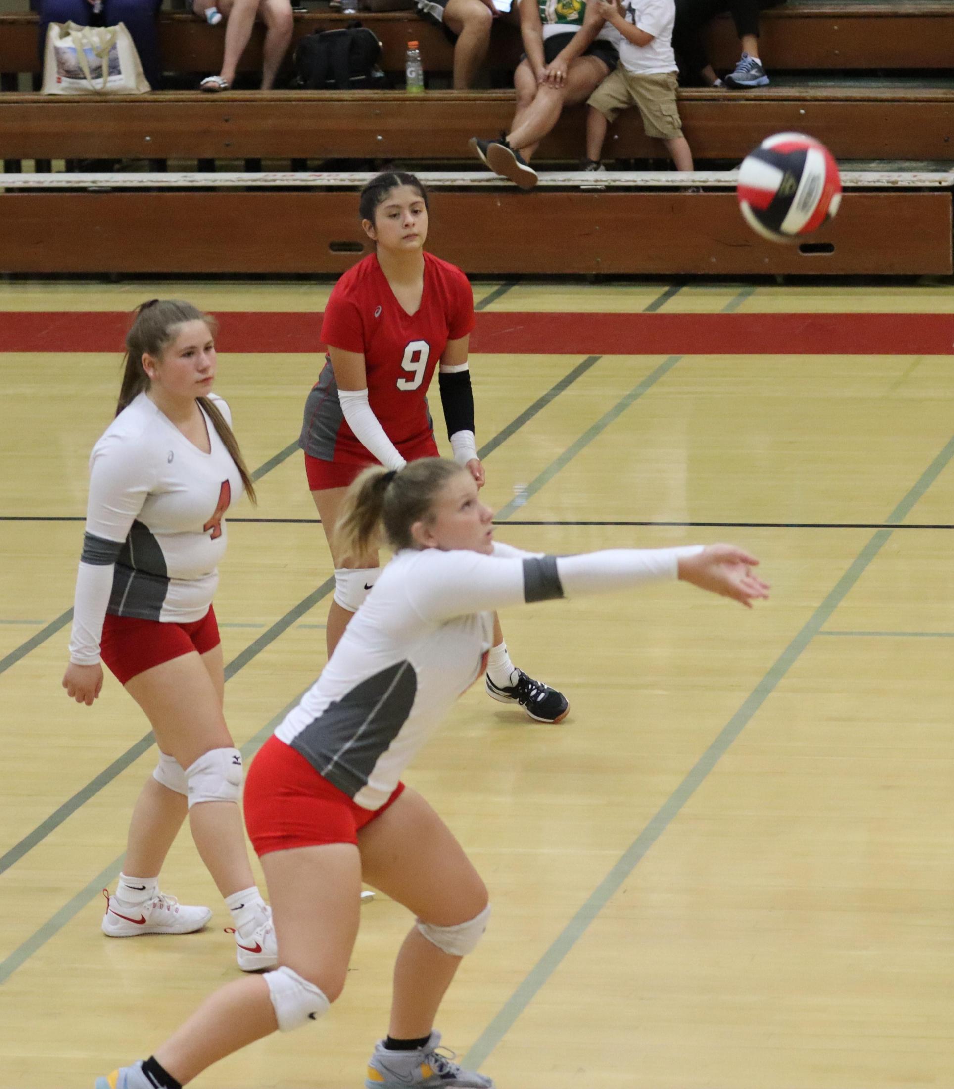 junior varsity girls playing volleyball against Mendota