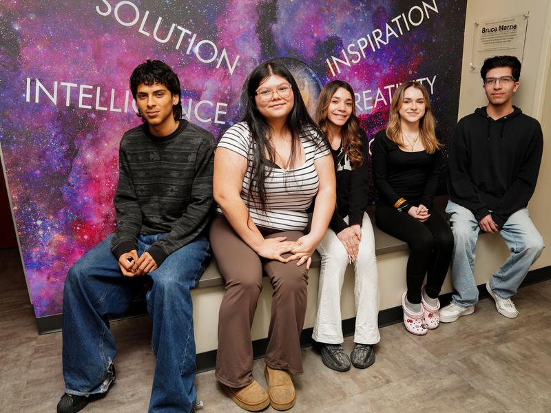 Students sitting together in front of the new Innovation Lab