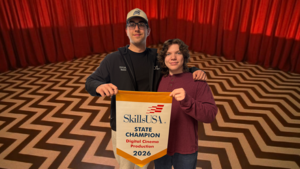 Smiling students with awards