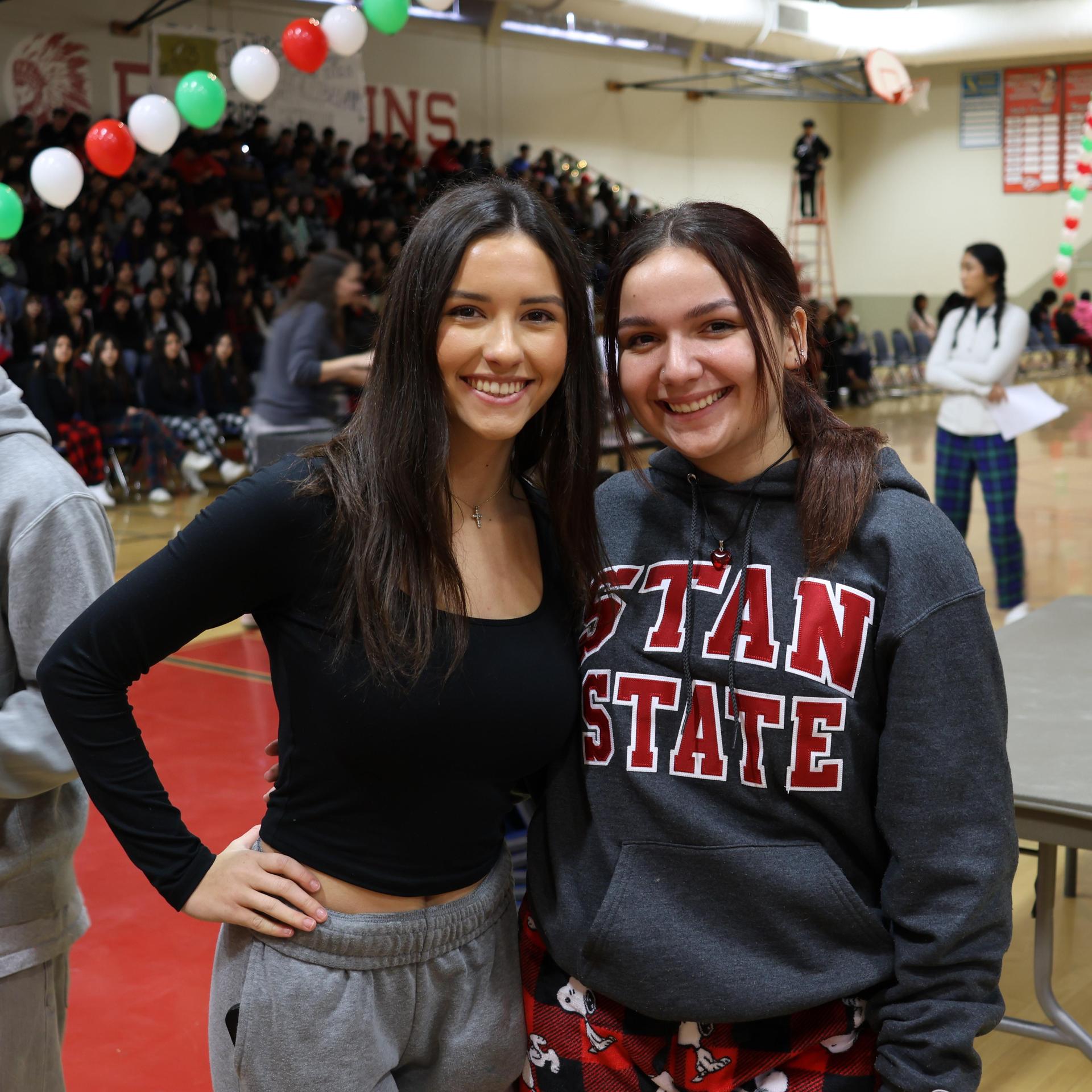 students and staff posing at the winter wishes rally