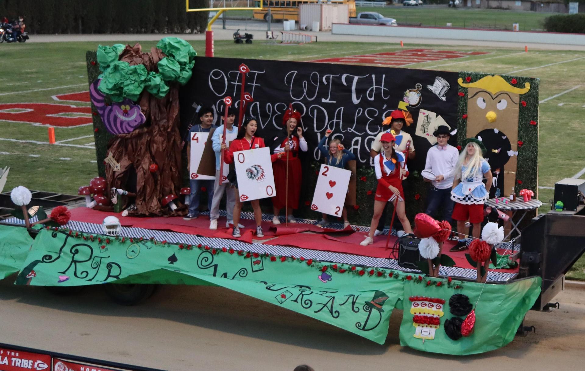 students, staff, and community members enjoying Friday night at the football game