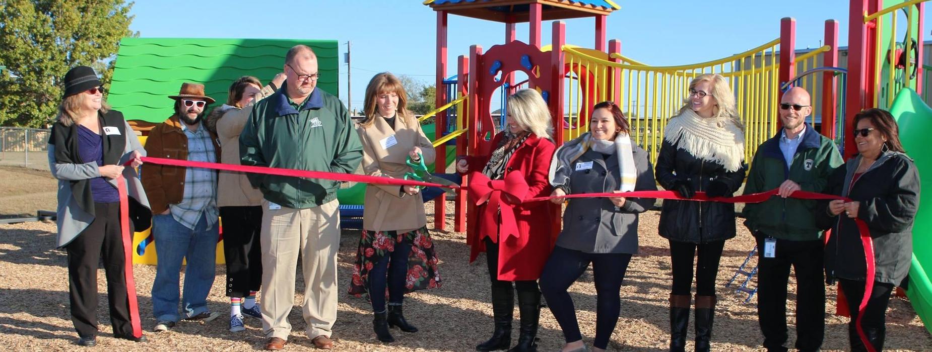 ribbon cutting for new playground