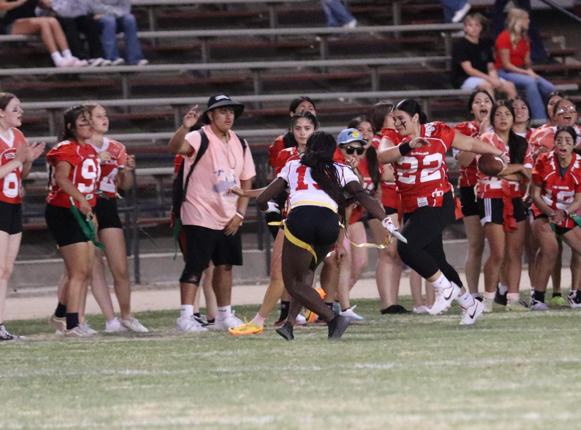 girls playing flag football