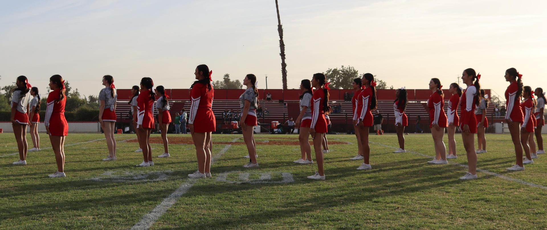 Cheerleaders performing at the football game
