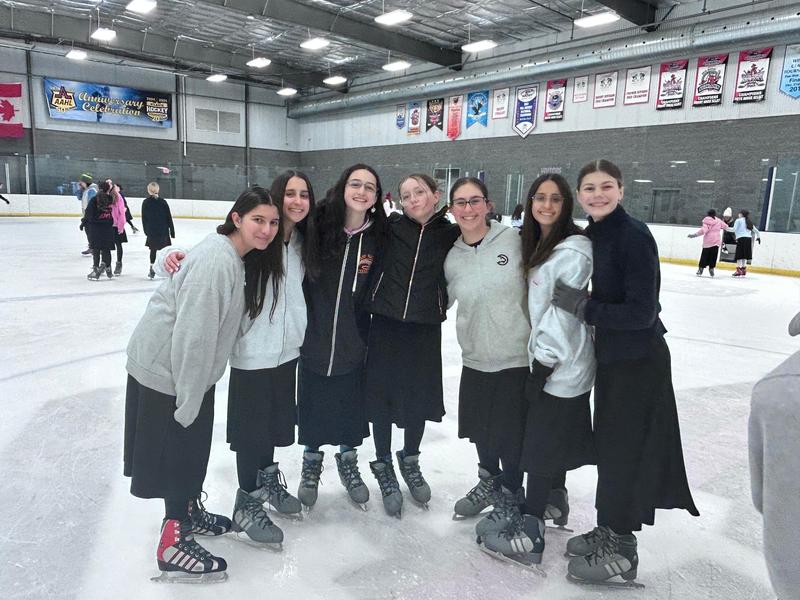 The girls ice skating