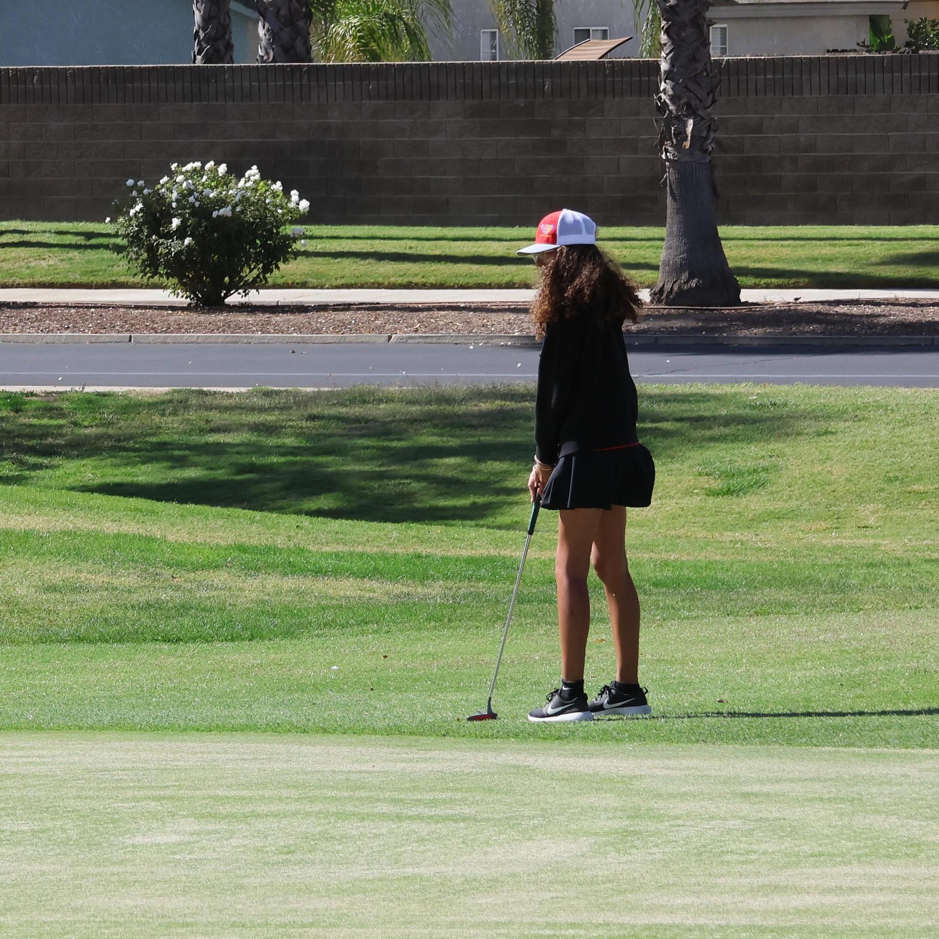 Girls golfers in action at the championships