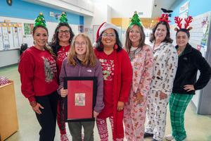 KRES staff with Lily Babb, Elementary 2025 Christmas Card winner