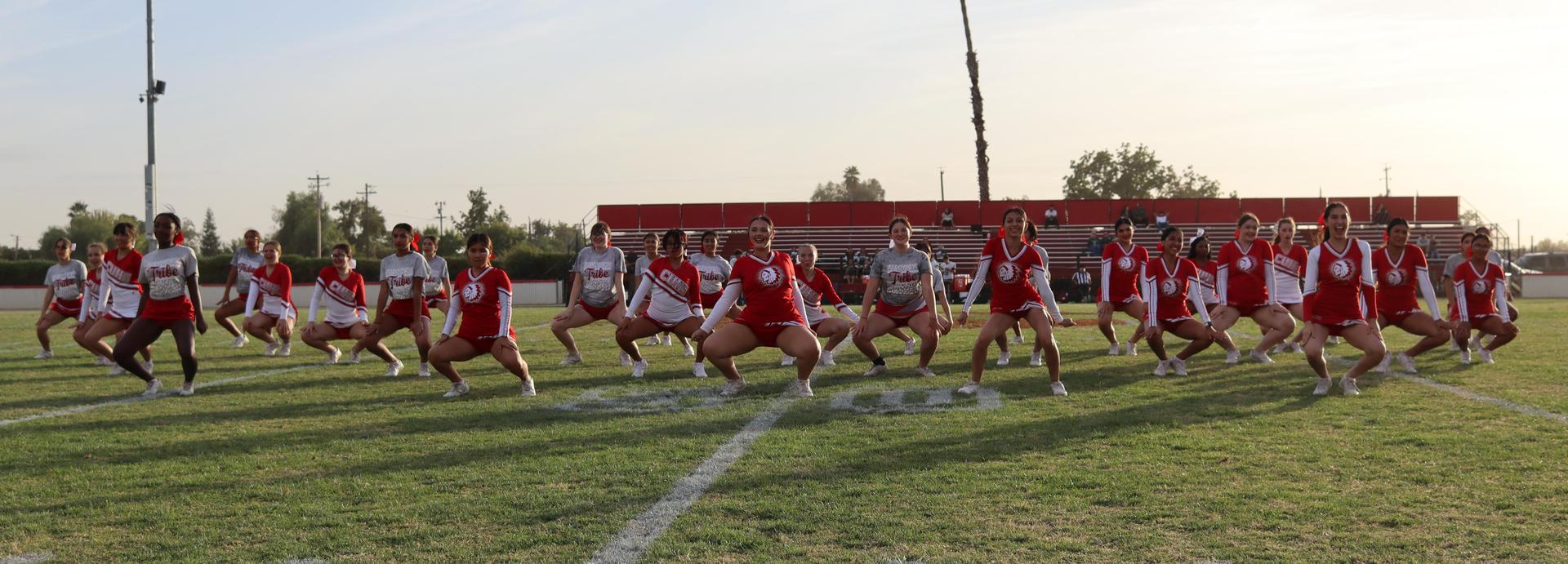 Cheerleaders performing at the football game