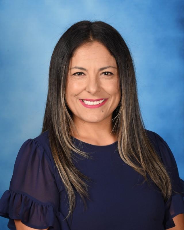 Portrait of Principal Yesenia Casillas with dark brown hair