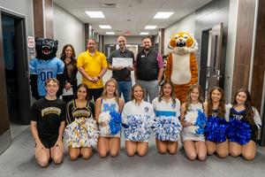 Staff and Students celebrate during Prize Patrol