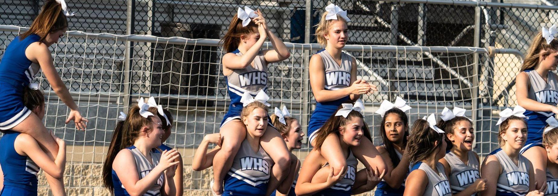 Freshman cheerleaders at a football game
