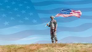 Soldier Holding American Flag