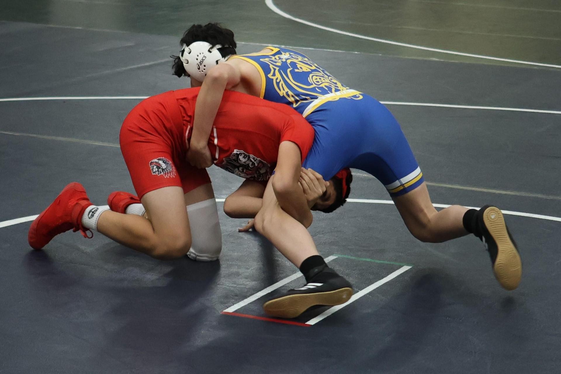 Boys wrestling in the Liberty Duals event 57