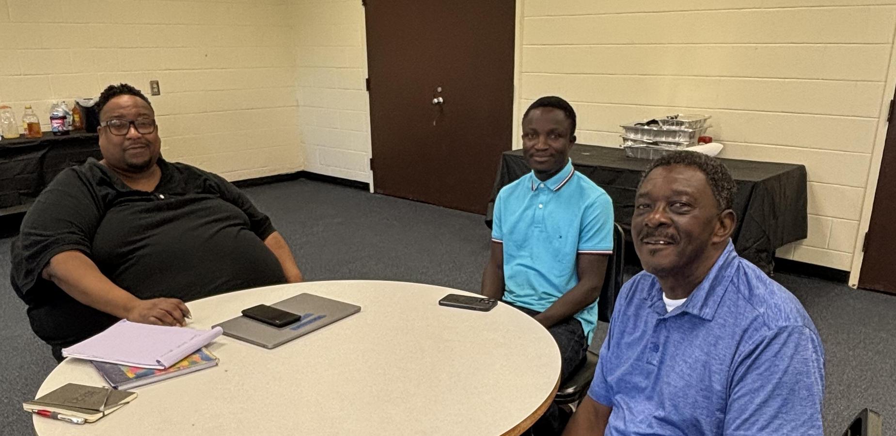 Mr. Simmons, D.Armoh, and C.White GOA staff return