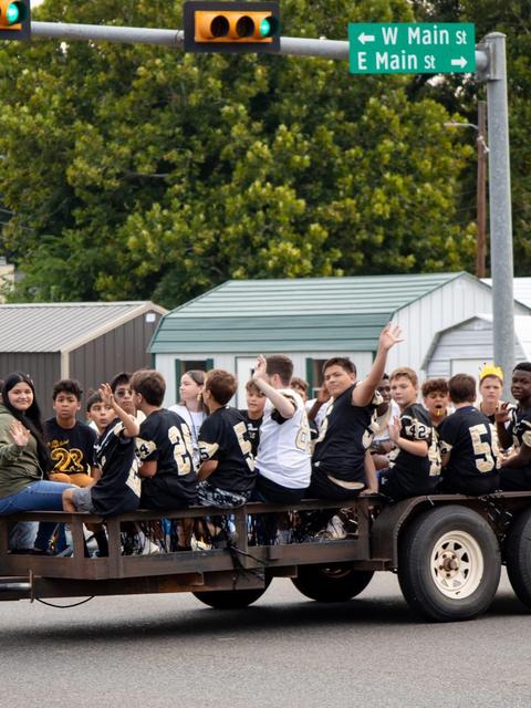STUDENTS ON A TRAILER