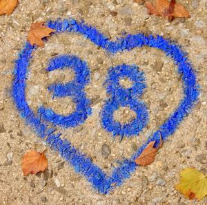 38 with a heart around it