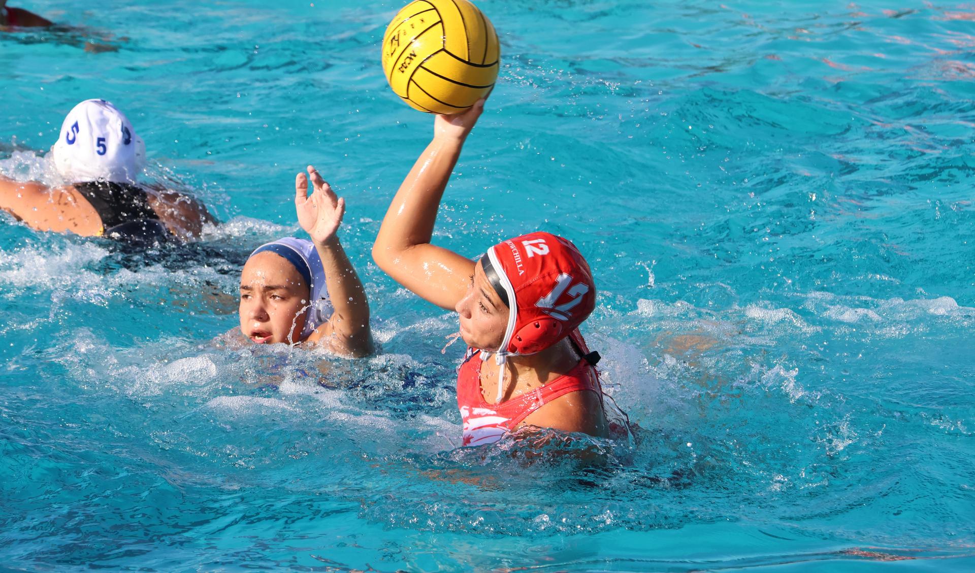 girls playing water polo against Sanger West