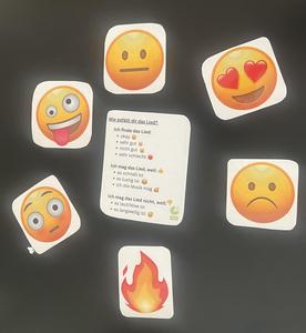 Six emoji graphics with a message about song preferences.