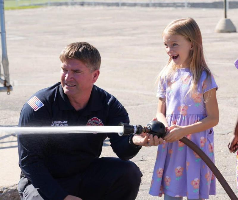 hoover student with firefighter