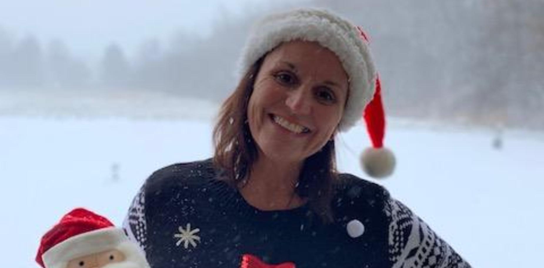 Teacher in Christmas attire