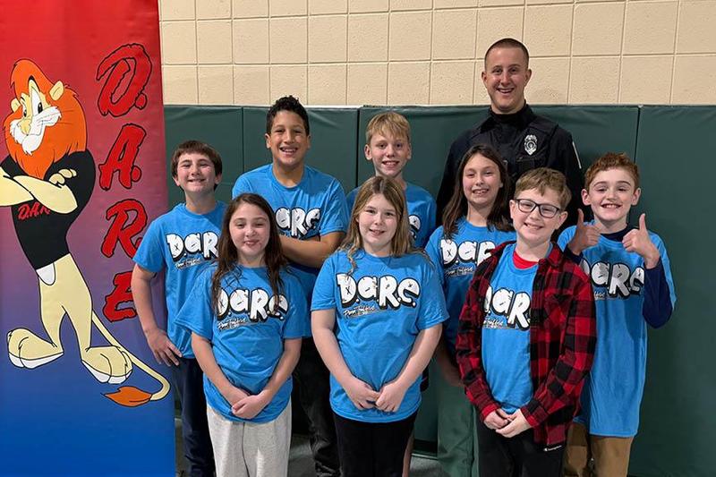 Officer Meyers and the Trafford Elementary project winners