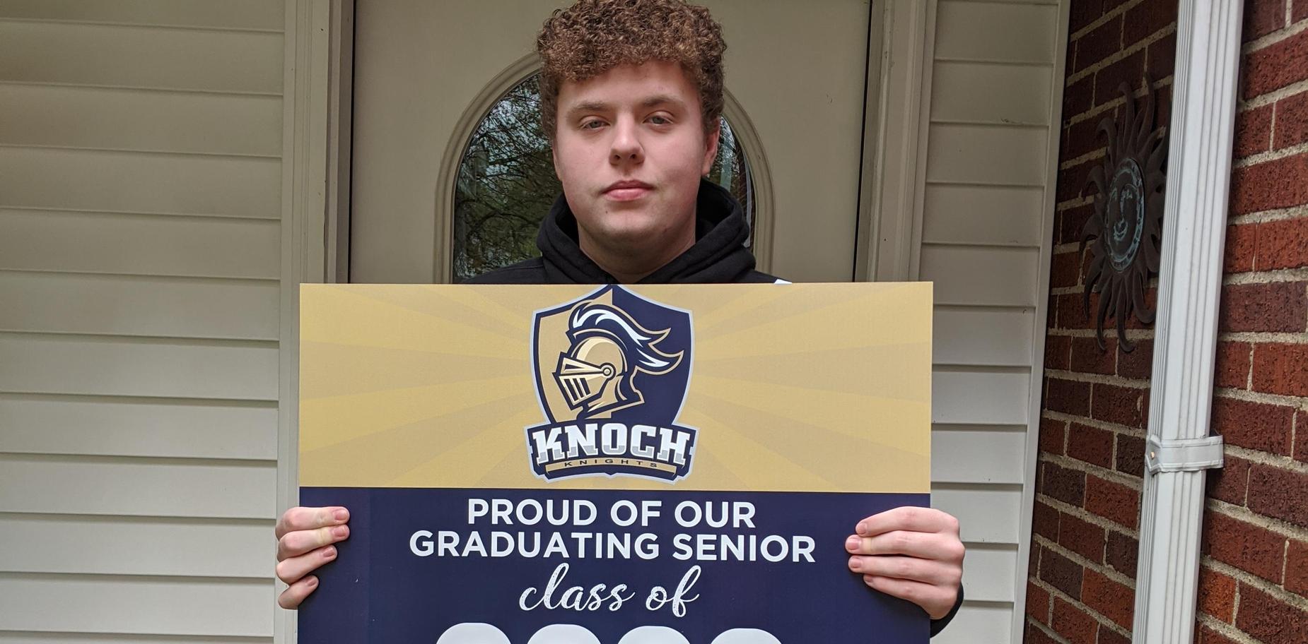 Senior receiving cap and gown