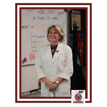 Photo of a woman in a lab coat